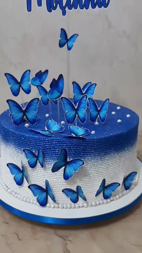 bolo de borboleta azul e rosa